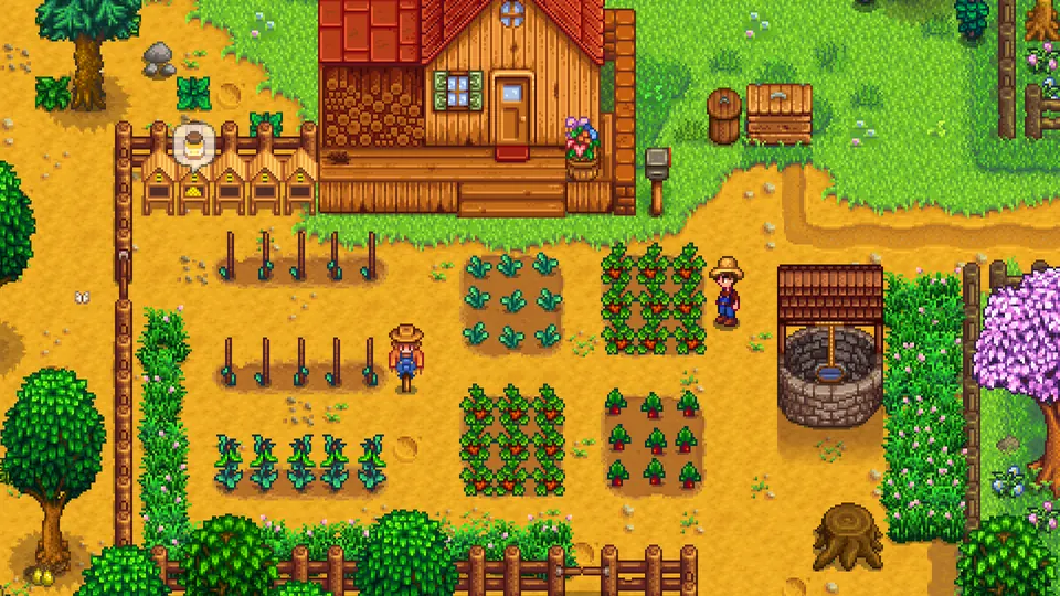 Captura oficial de una granja de Stardew Valley con cultivos, herramientas, edificios y dos granjeros